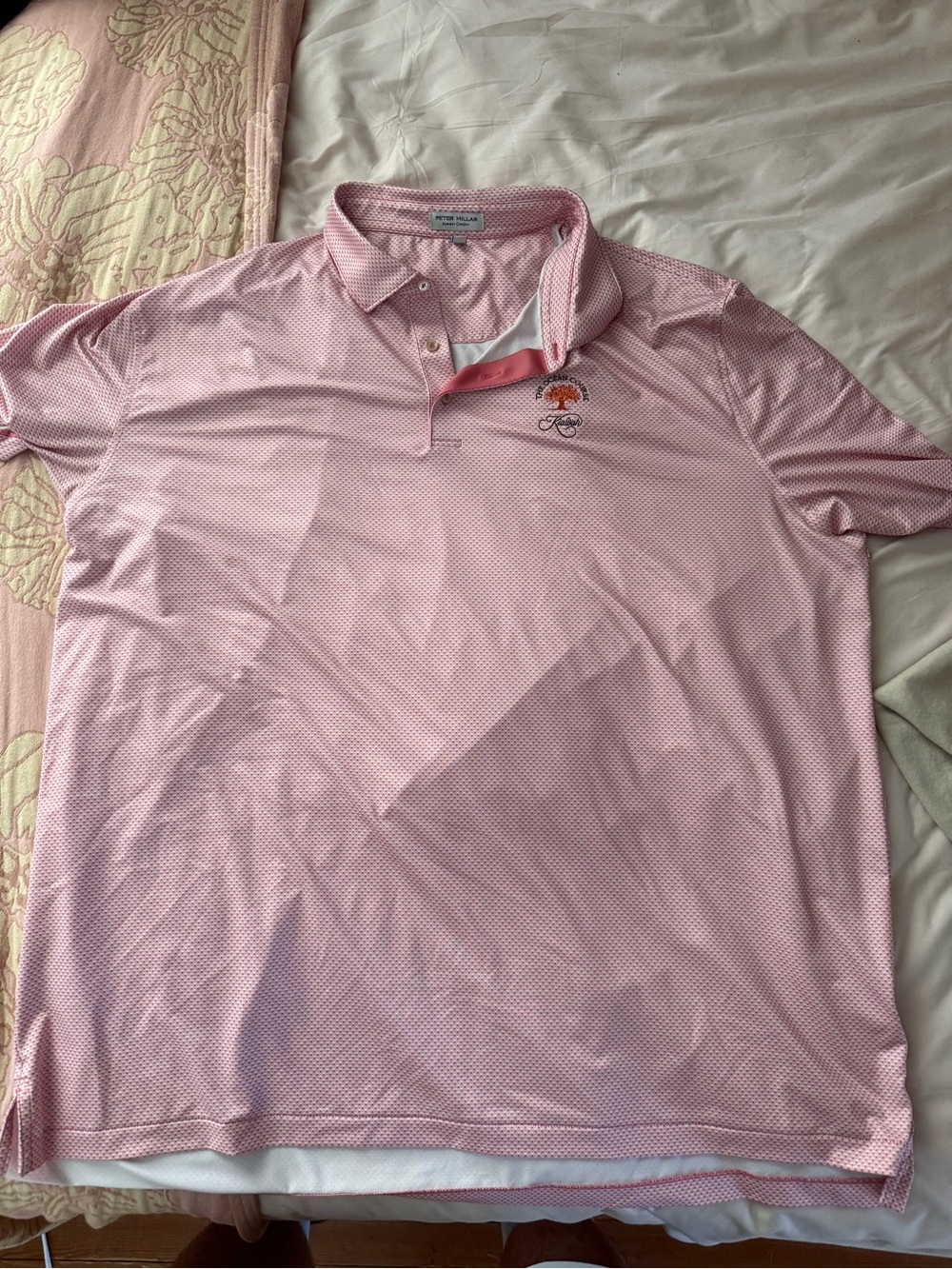 Peter Millar Pink Patterned Performance Polo with Kiawah island ocean course